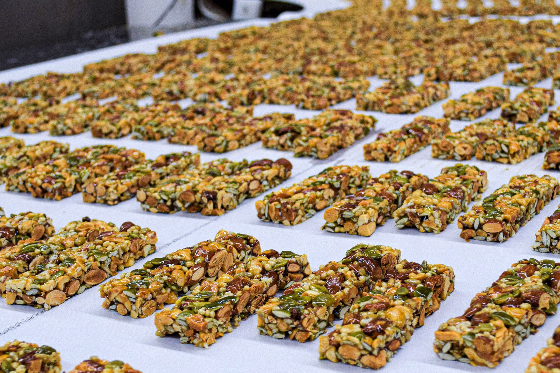 Conveyer belt with granola bars.